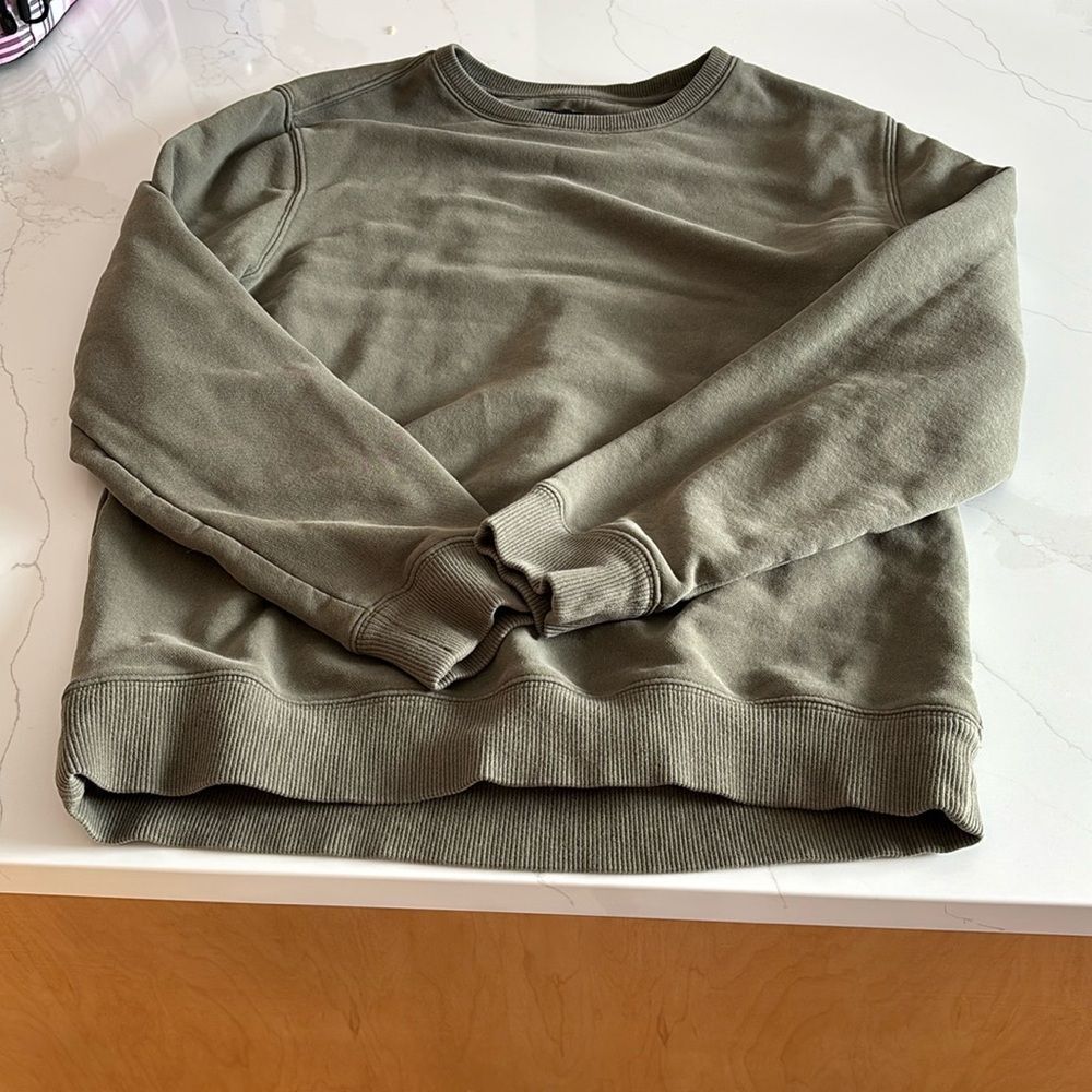 Denver Hayes green sweater